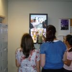 digital signage student area watching digital signage student area watching