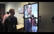 A Fun Digital Signage Experience using Augmented Reality